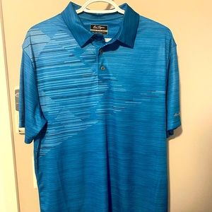 Brand new Ben Hogan Medium size golf shirt.